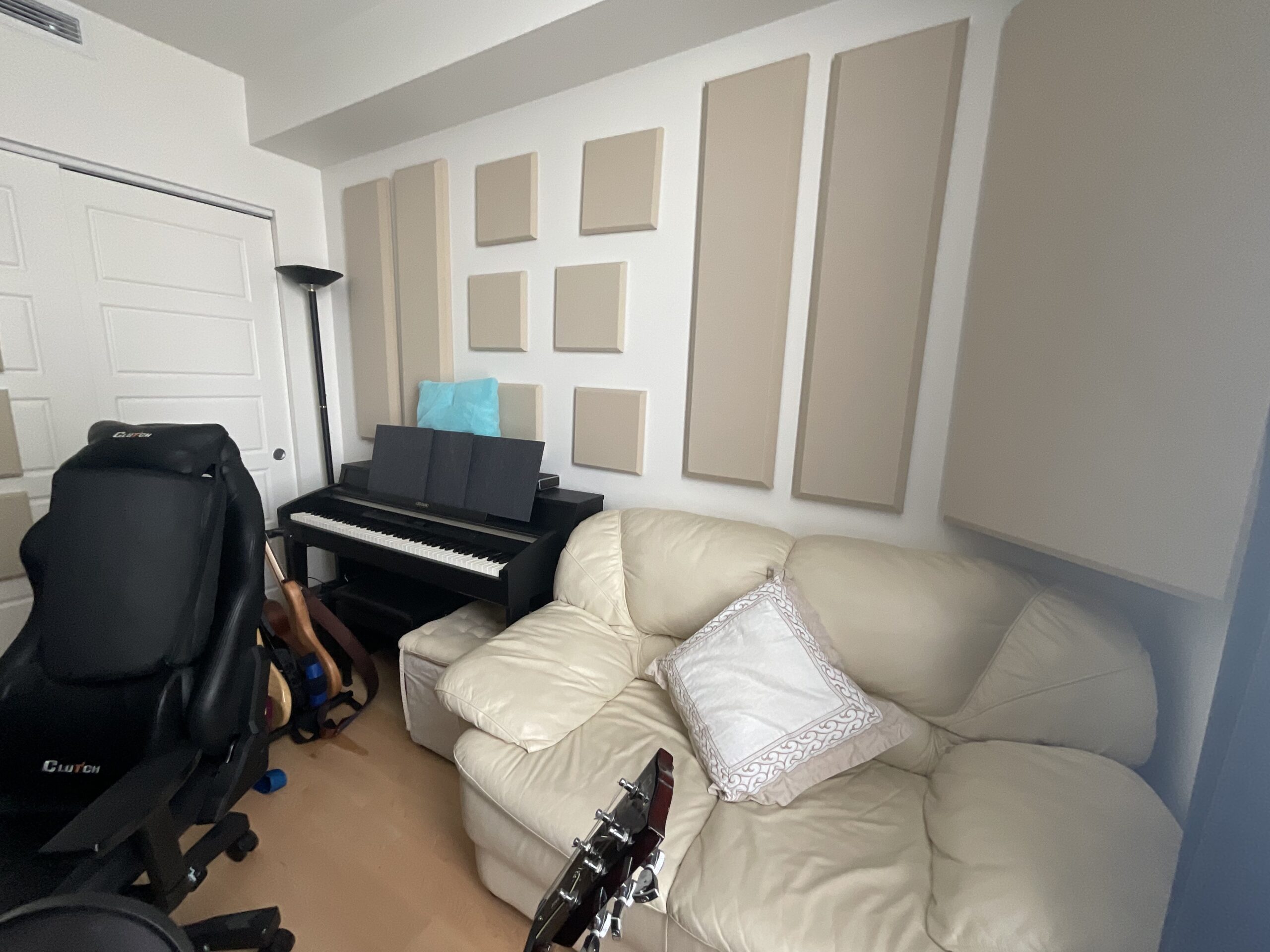 Live room with piano and acoustic treatment